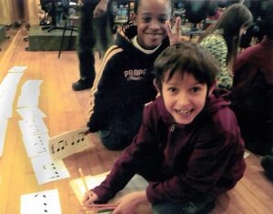 Alexis, pictured with fellow Symphony Orchestra cellist Giacomo Glotzer, circa 2012